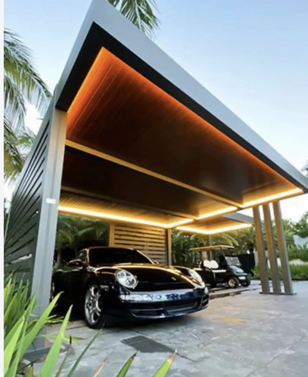Carport with cove lighting in the ceiling